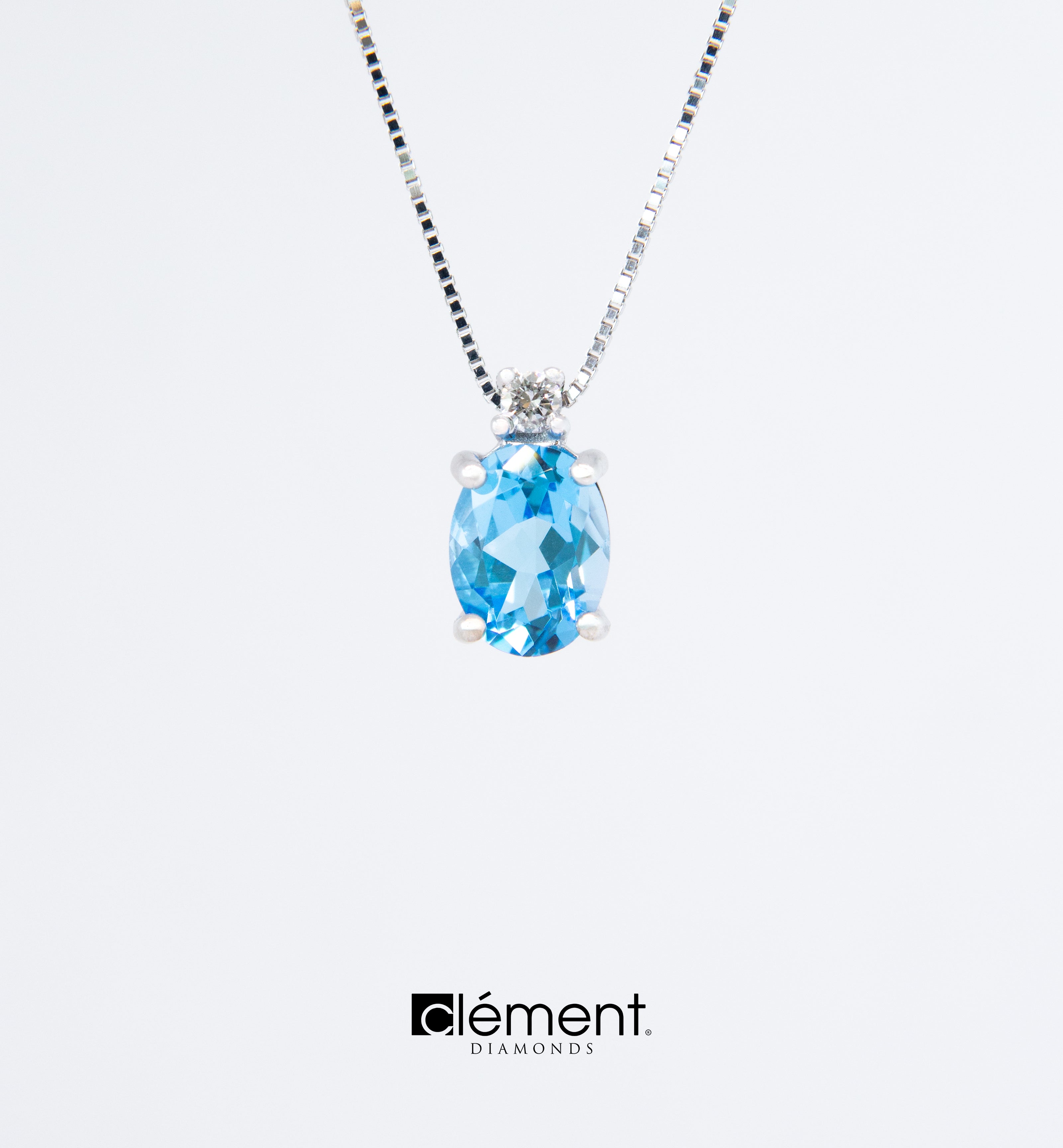 18ct White Gold Swiss Blue Topaz and Diamond Pendant