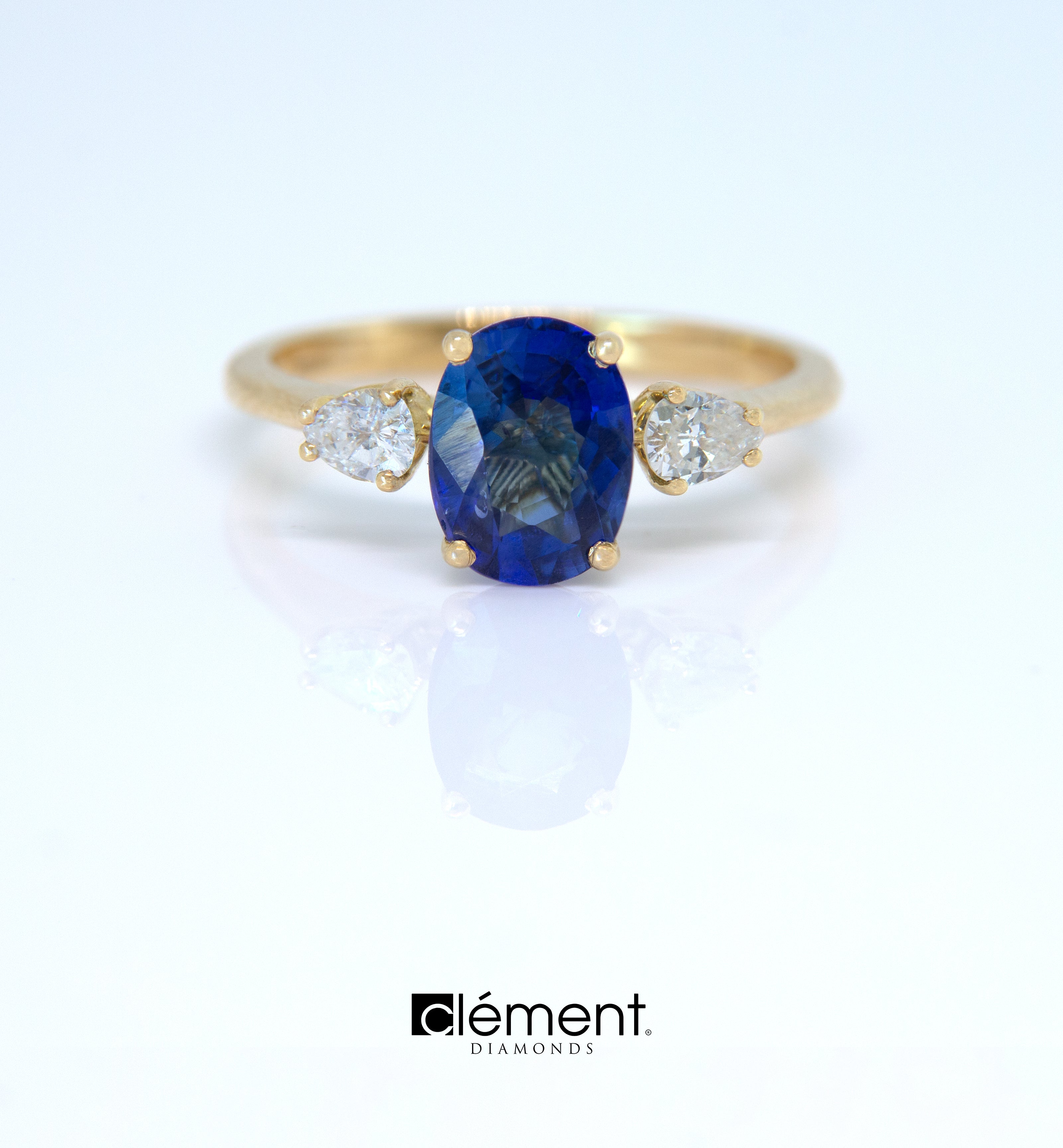 18ct Yellow Gold Blue Sapphire Ring With Side Pear Shape Diamonds