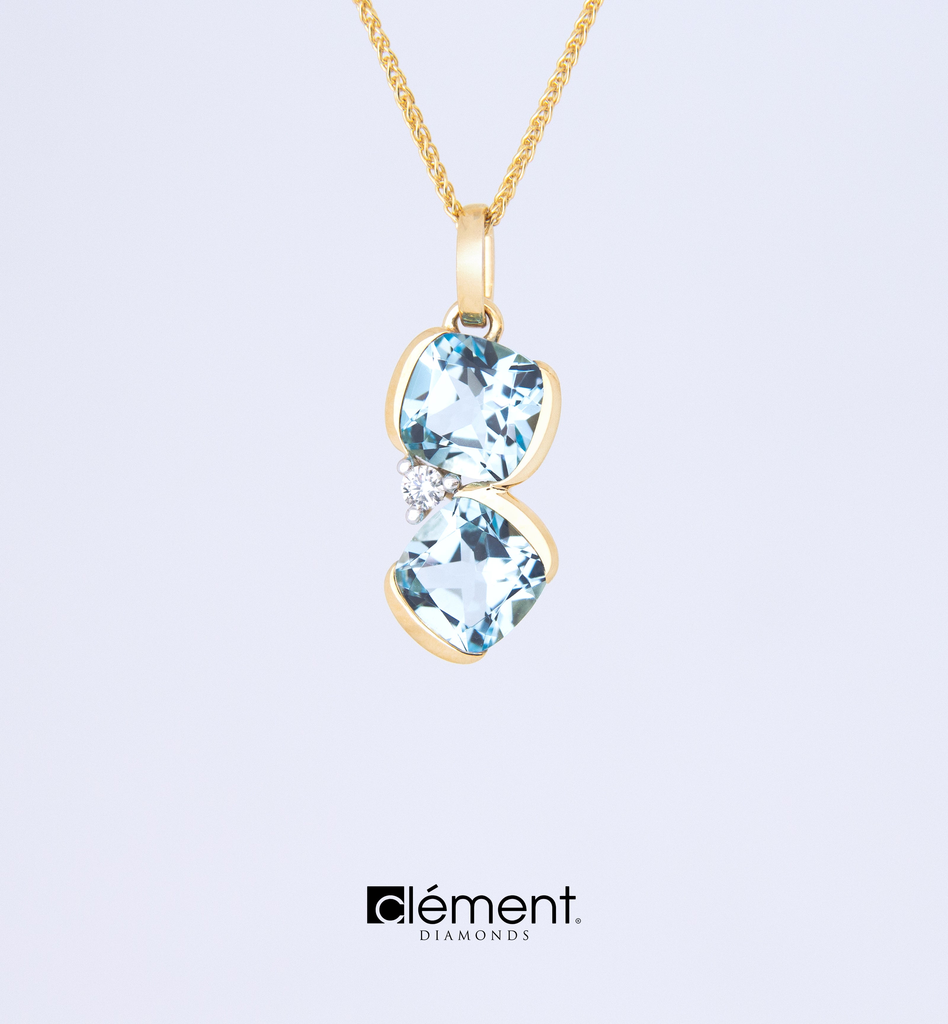 18ct Gold Diamond and Sky Blue Topaz Pendant